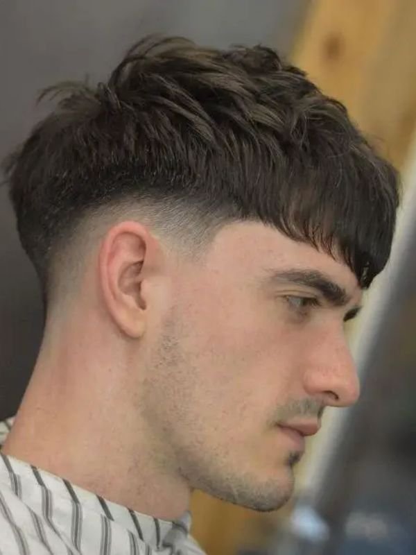 Low Taper Fade Fluffy Hair with Fringe
