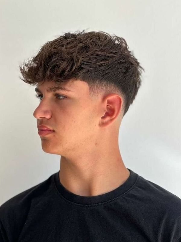 Low Taper Fade Fluffy Hair with Textured Top