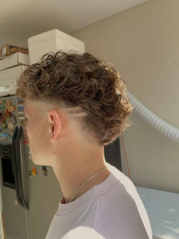 Low Taper Fade Modern Mullet with Hair Design