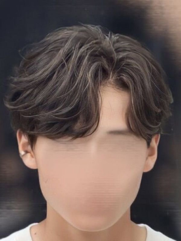 Wavy Hair Low Taper Fade Middle Part